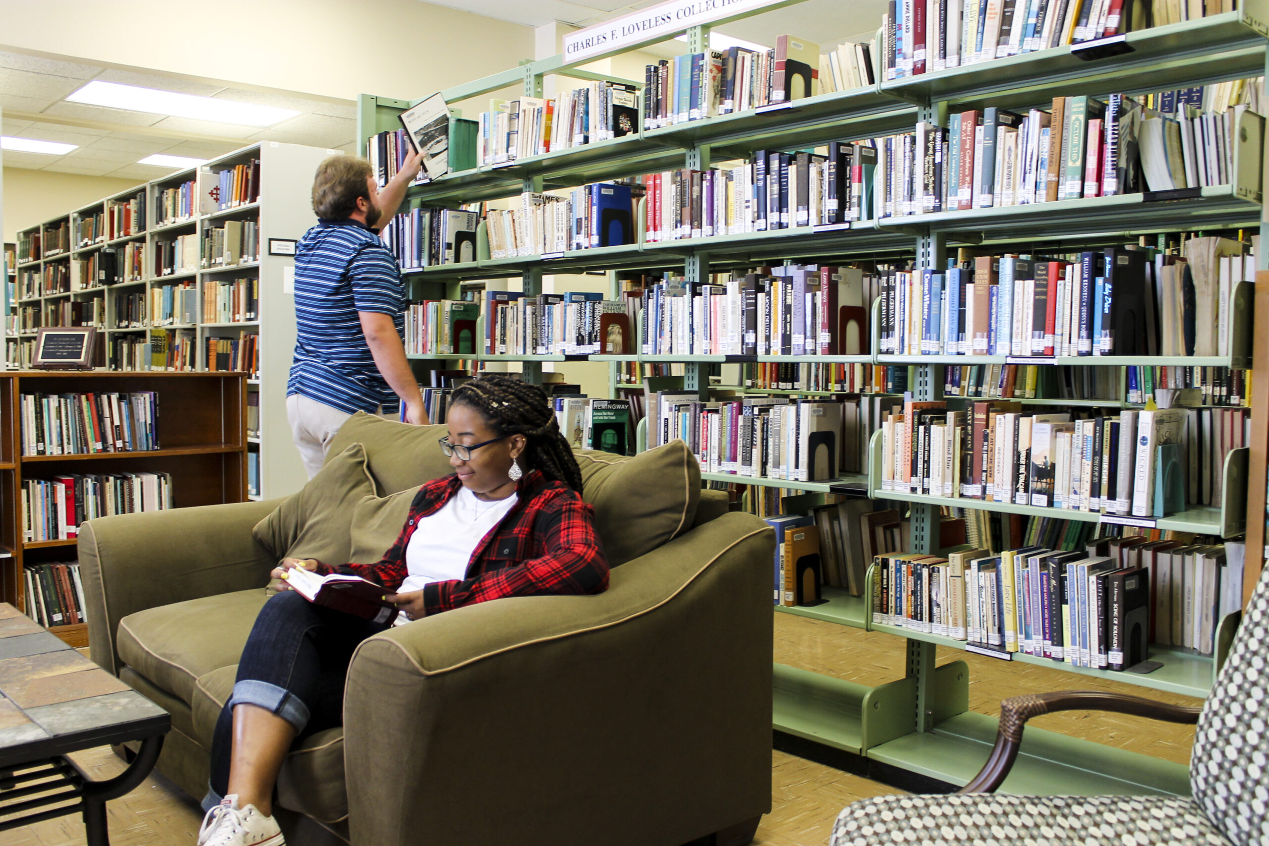 Two students studying at the library