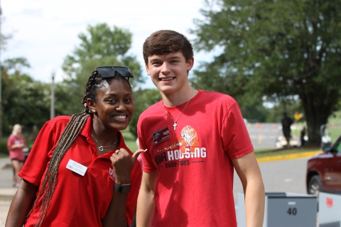 Two UWA students moving into Gilbert Hall.