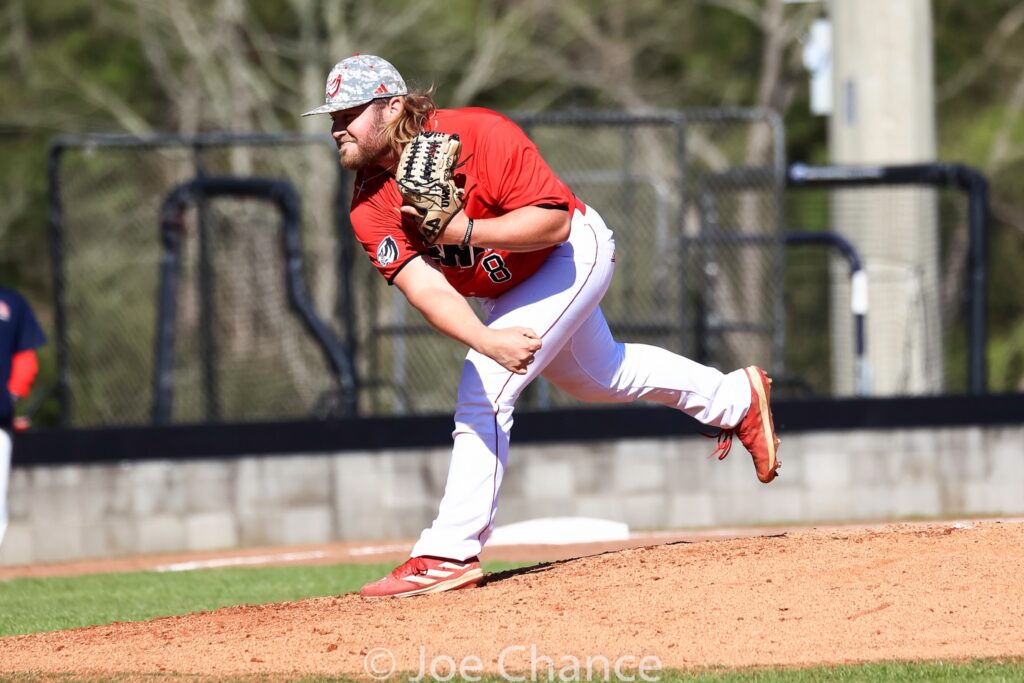 UWA Baseball player pitching the ball